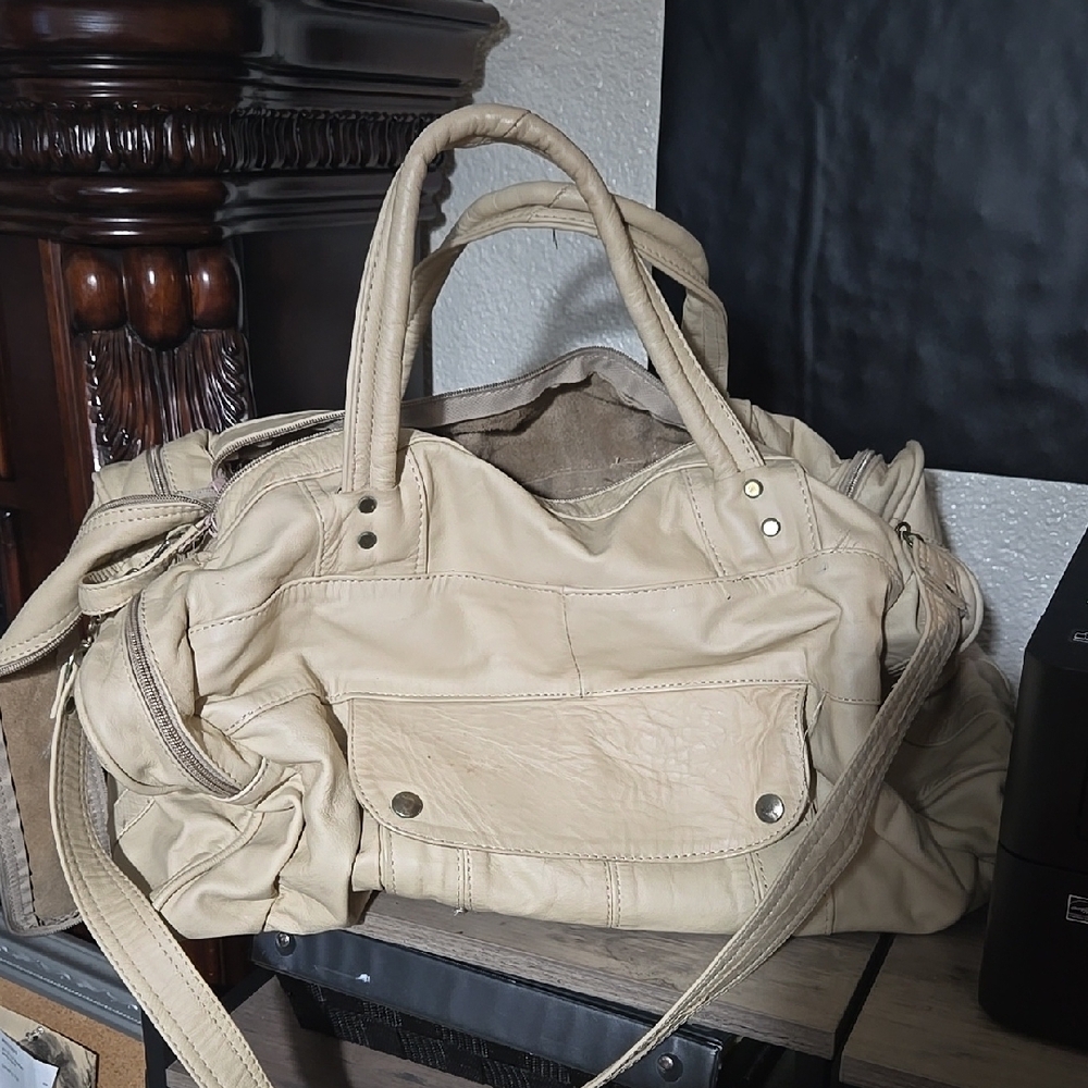 Cream Shoulder Bag with Adjustable Strap and Soft Design